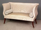A mahogany Regency style sofa