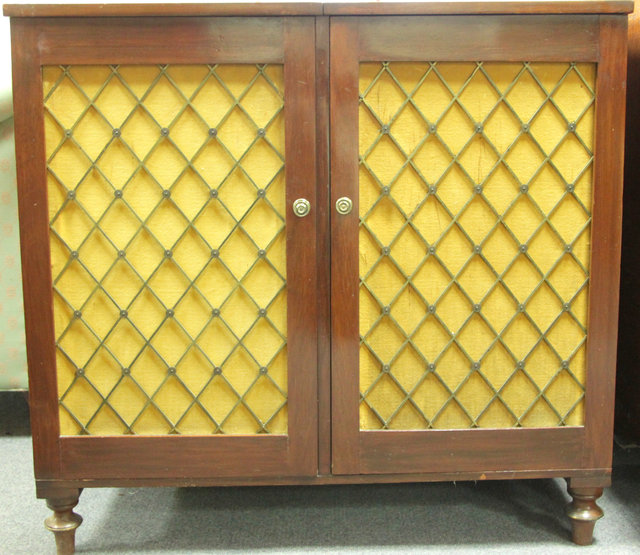 A mahogany side cabinet the two