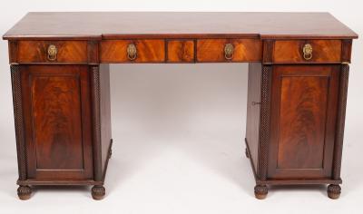 A mahogany sideboard fitted drawers
