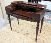 A MAHOGANY SPINET WRITING DESK