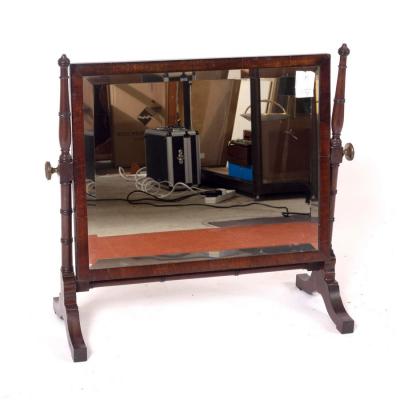 A mahogany swing frame dressing
