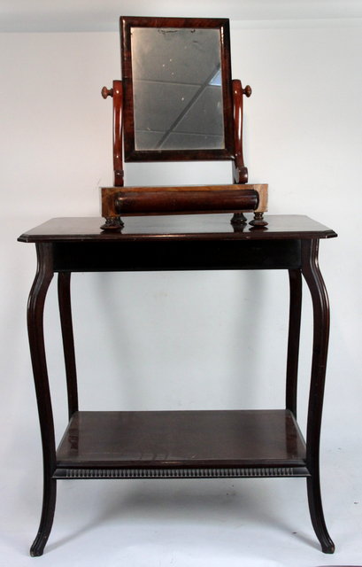 A mahogany table the moulded legs