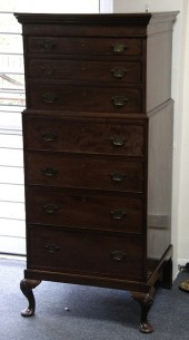 A mahogany tallboy chest fitte