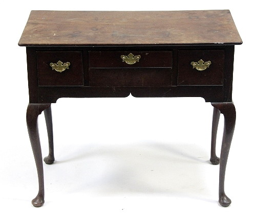 A mahogany three-drawer side