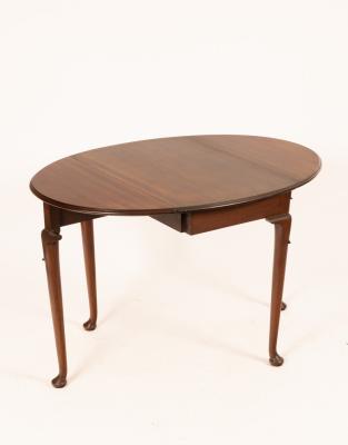 A mahogany two-flap table on
