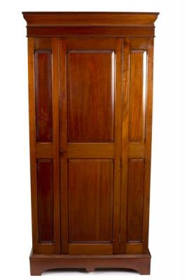 A mahogany wardrobe with central