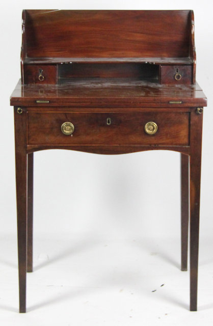 A mahogany writing table the