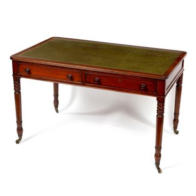 A mahogany writing table, the