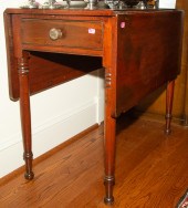 A MAHOGONY DROP LEAF TABLE 19t