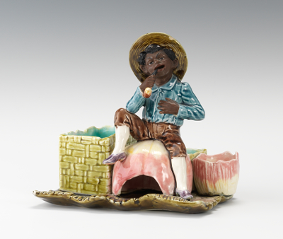 A Majolica Figural Match Strike