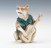 A Majolica Figural Musical Dog