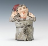 A Majolica Figural Tobacco Hum
