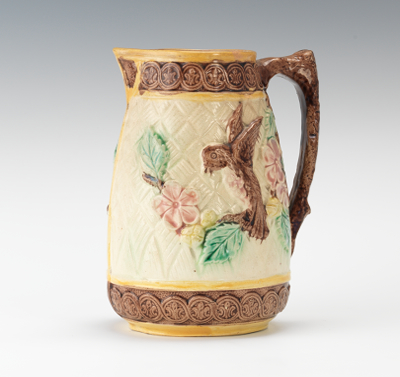 A Majolica Flower and Bird