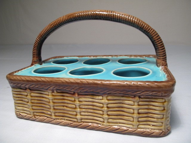 A Majolica pottery egg basket.