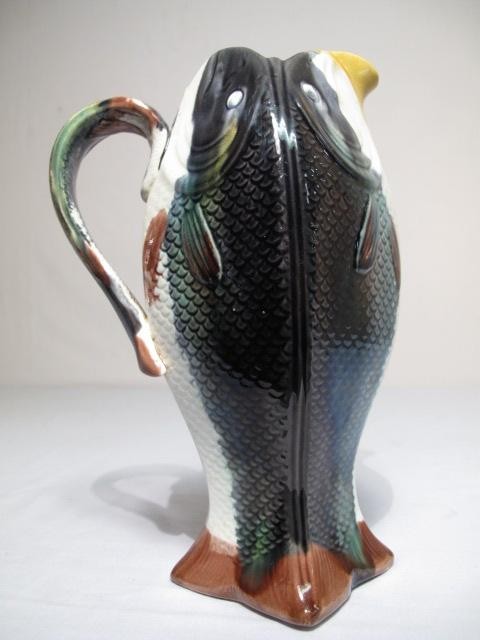 A Majolica pottery pitcher three
