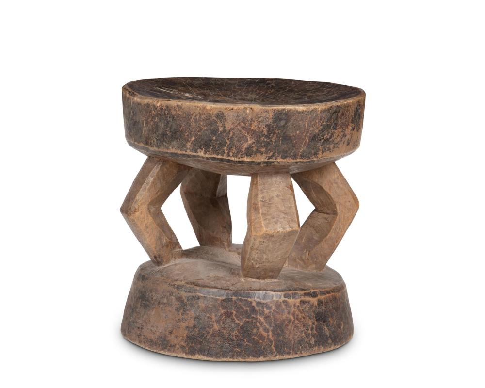 A MALIAN CARVED WOOD STOOLA