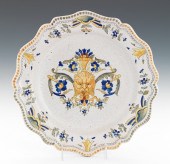 A Malicore Faience Charger Wit