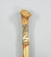 A Mallacca Stick with a Carved