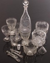 A mallet-shaped decanter engra