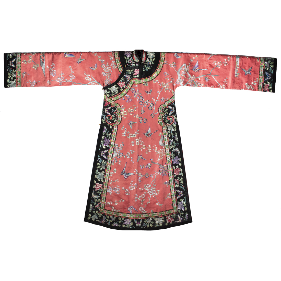 A MANCHU WOMAN'S EMBROIDERED SILK