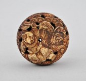 A Manju Netsuke Carved bone of