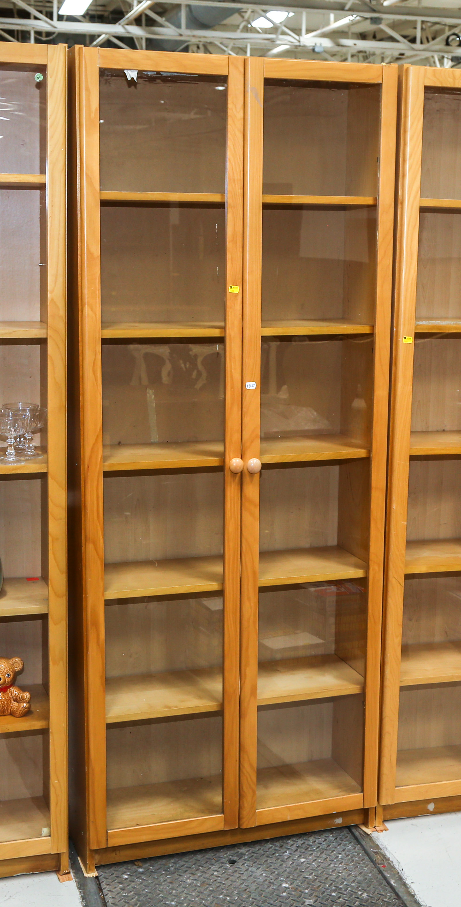 A MAPLE SIX-SHELF CABINET Modern;