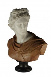 A MARBLE BUST OF THE APOLLO BE