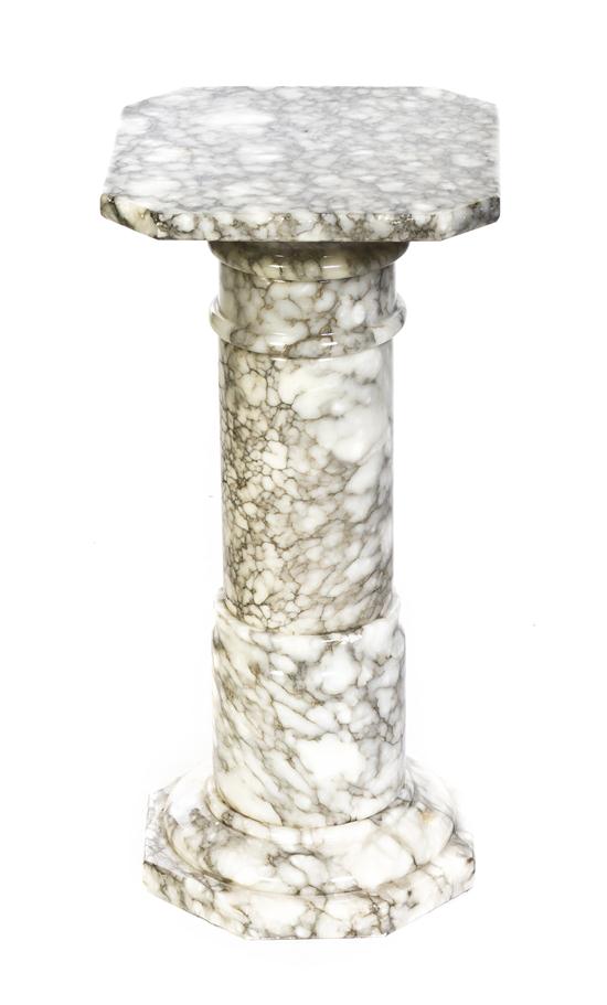 A Marble Pedestal having a