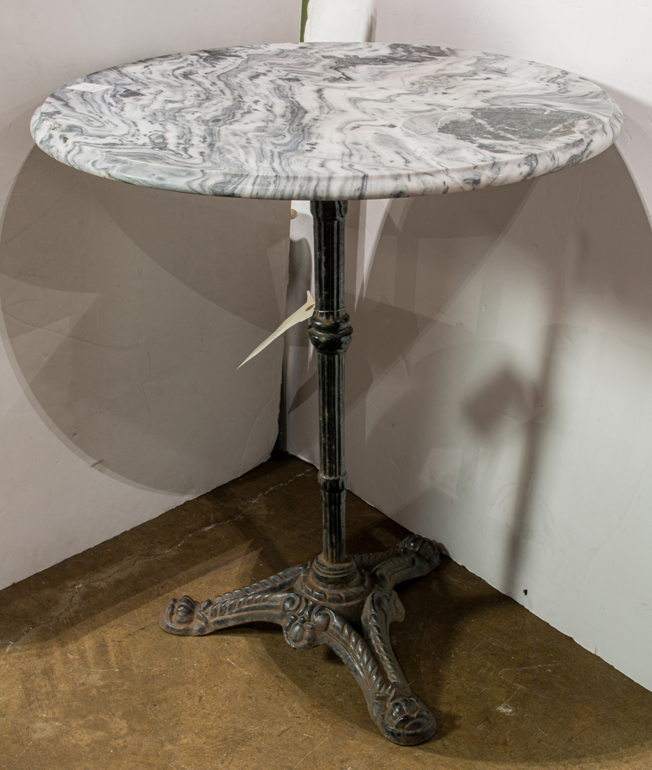 A MARBLE TOP BISTRO/CAFE TABLE WITH