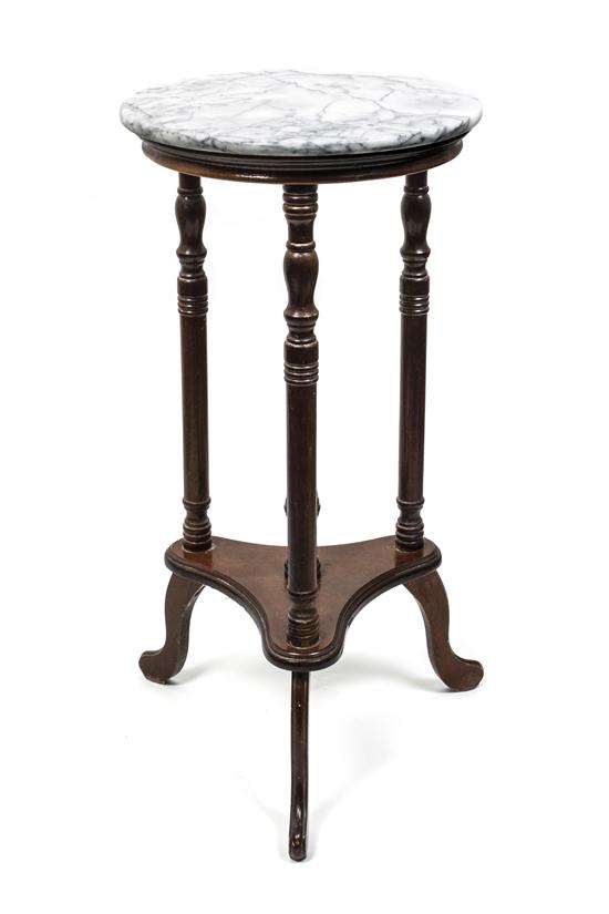 A Marble Top Side Table having a