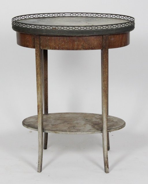 A marble top two-tier table with