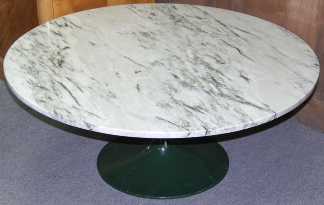 A marble topped coffee table in the