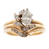A MARQUISE DIAMOND WEDDING SET