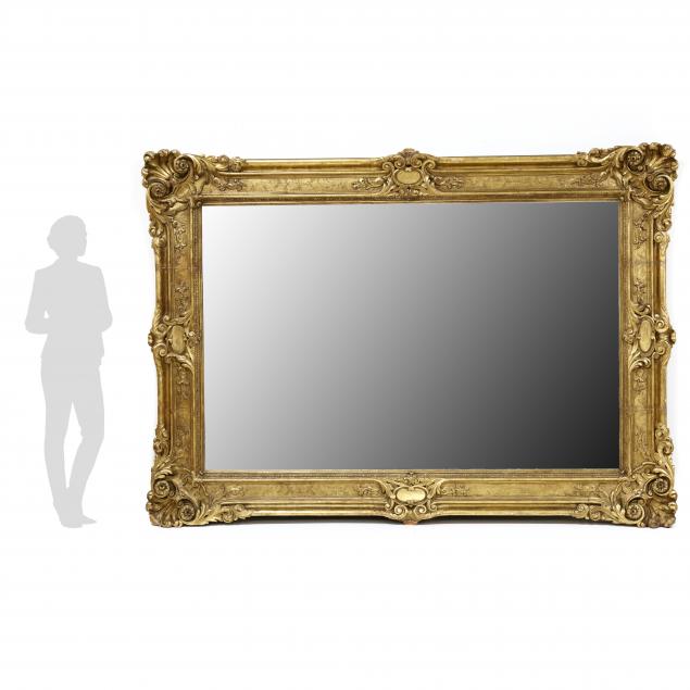 A MASSIVE ANTIQUE CARVED AND GILT