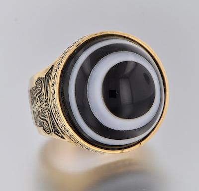 A Massive Gold Ring With Bull's Eye