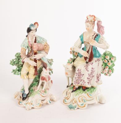 A matched pair of Derby figures