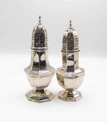 A matched pair of silver sugar
