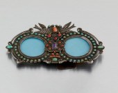 A MATL SILVER AND GEM-SET FRAM