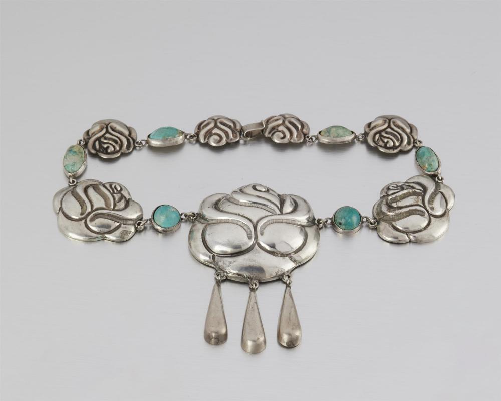 A MATL SILVER AND TURQUOISE ROSE