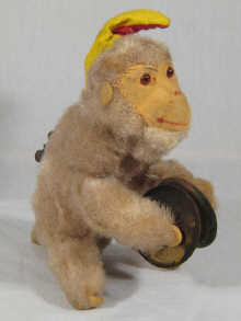 A mechanical monkey toy playing