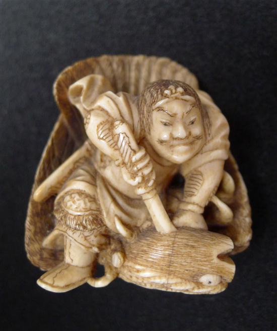 A Meiji period ivory netsuke carved