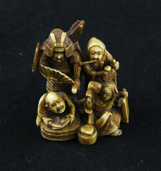A Meiji period ivory netsuke carved
