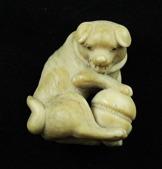 A Meiji period ivory netsuke carved