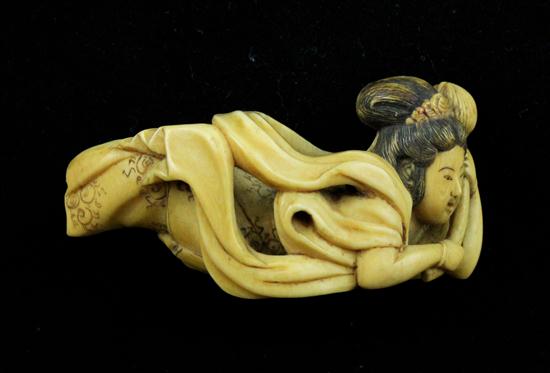 A Meiji period ivory netsuke carved