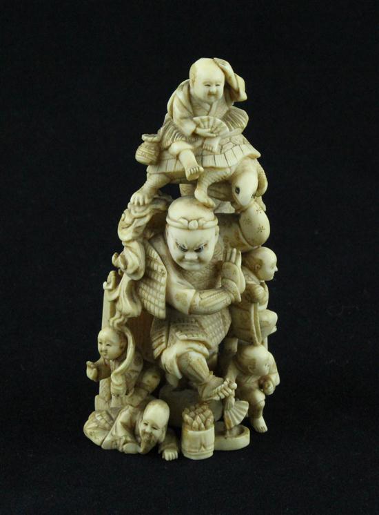 A Meiji period ivory netsuke carved