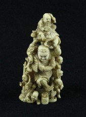 A Meiji period ivory netsuke c