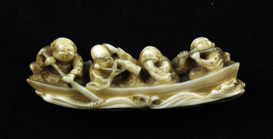 A Meiji period ivory netsuke carved