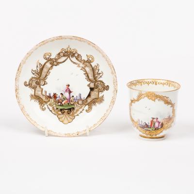 A Meissen cup and a saucer