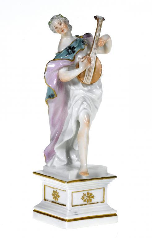 A MEISSEN FIGURE OF A MUSICIAN
