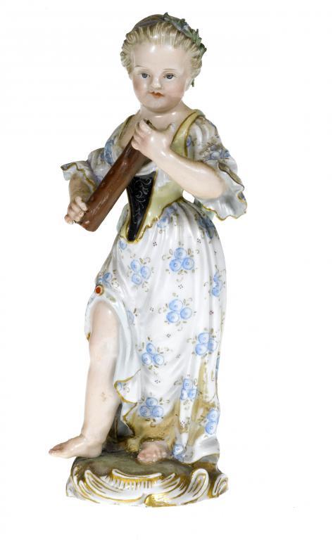 A MEISSEN FIGURE OF A GIRL  in a